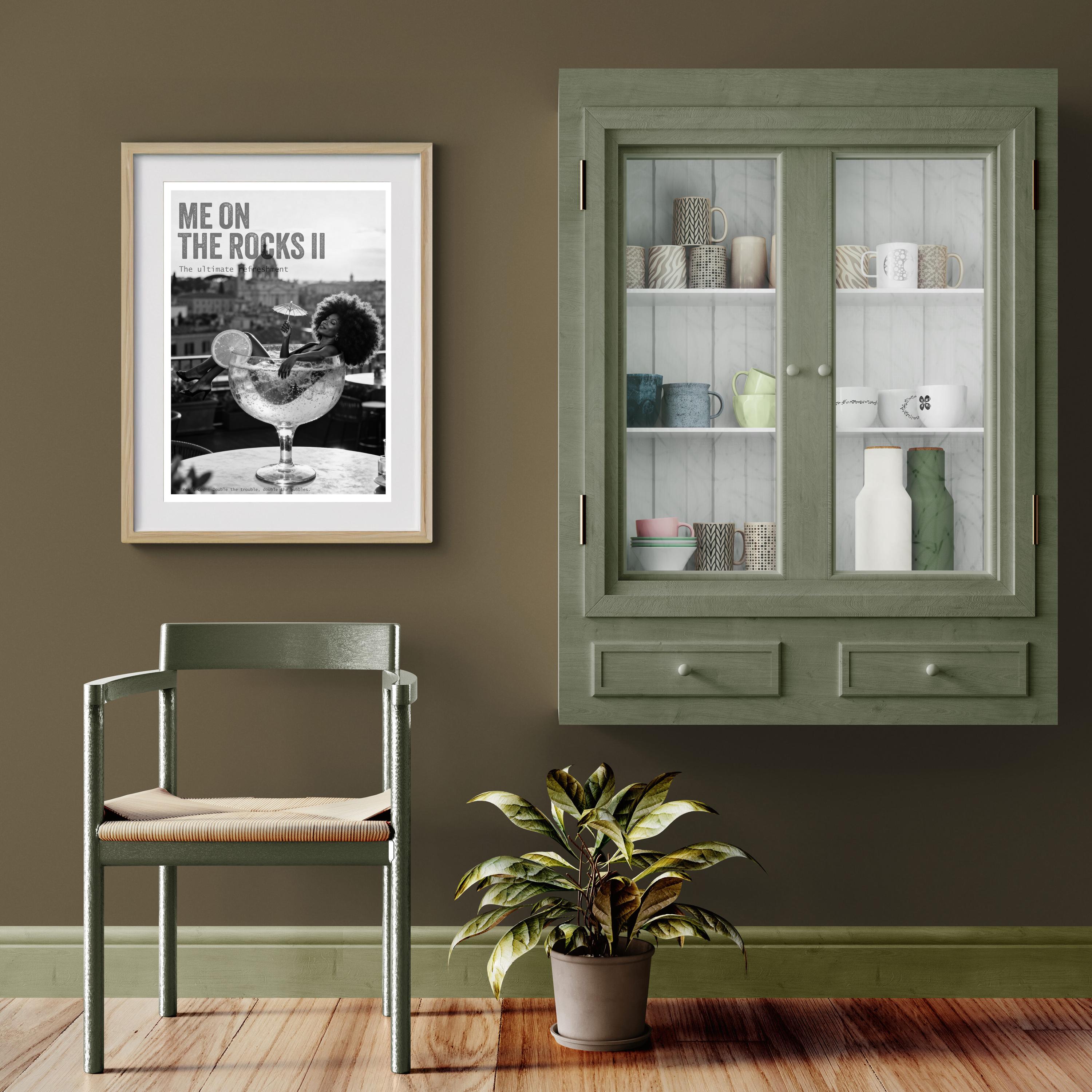 Room interior with a green cabinet, chair, and plant against a brown wall.