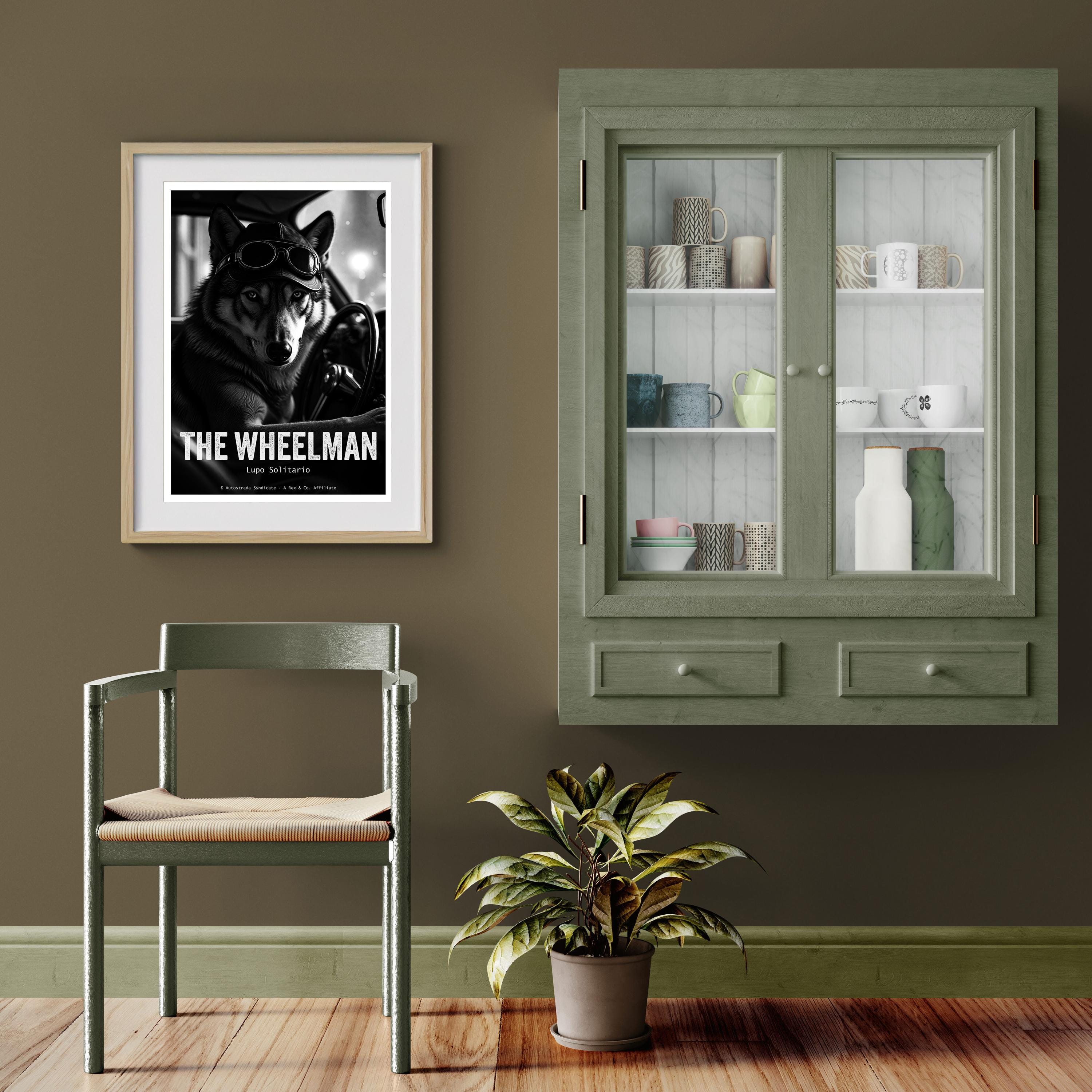Room interior with a framed poster, chair, plant, and cabinet.