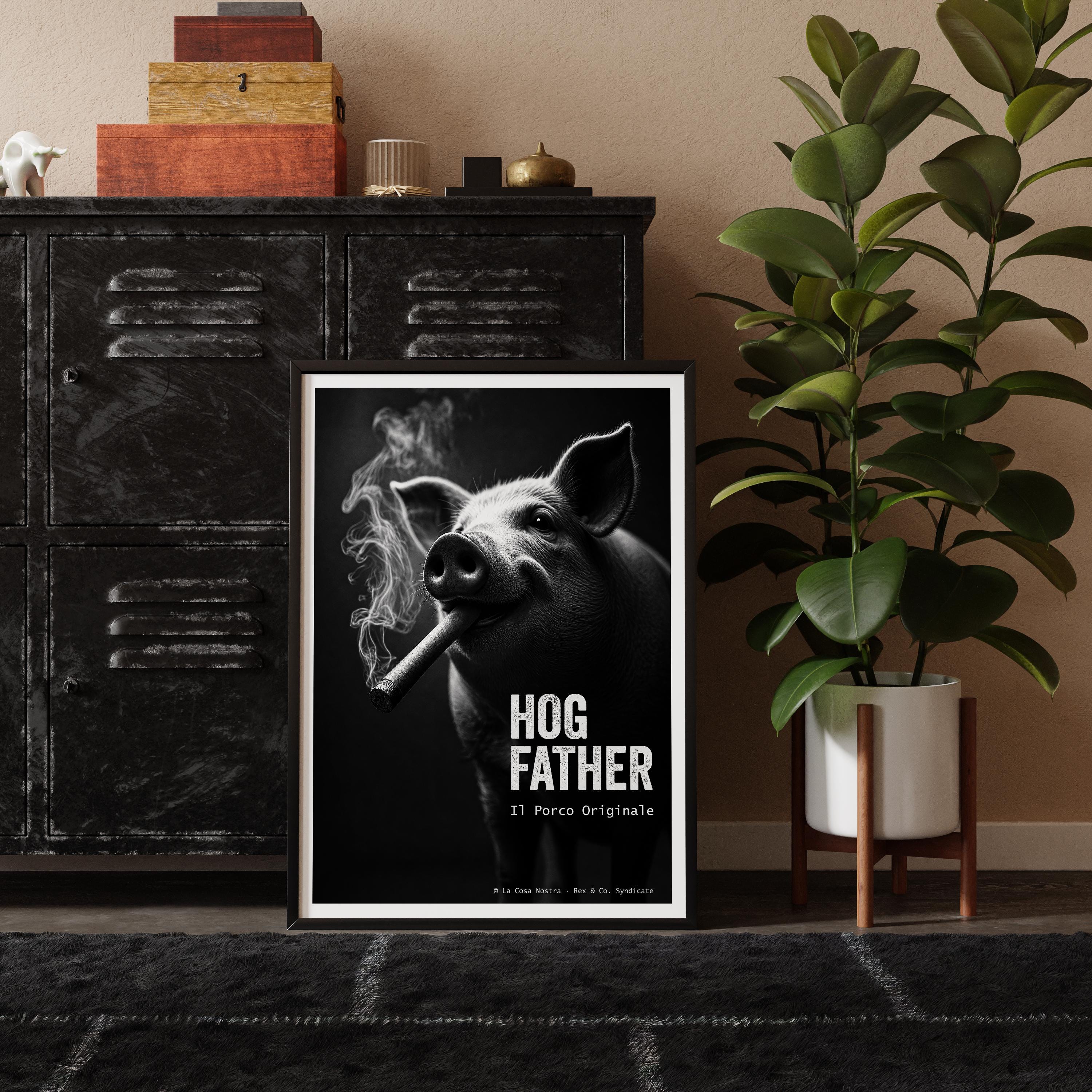 Framed poster of a pig smoking a cigar with 'Hog Father' text, placed on a shelf with decorative items and a plant.