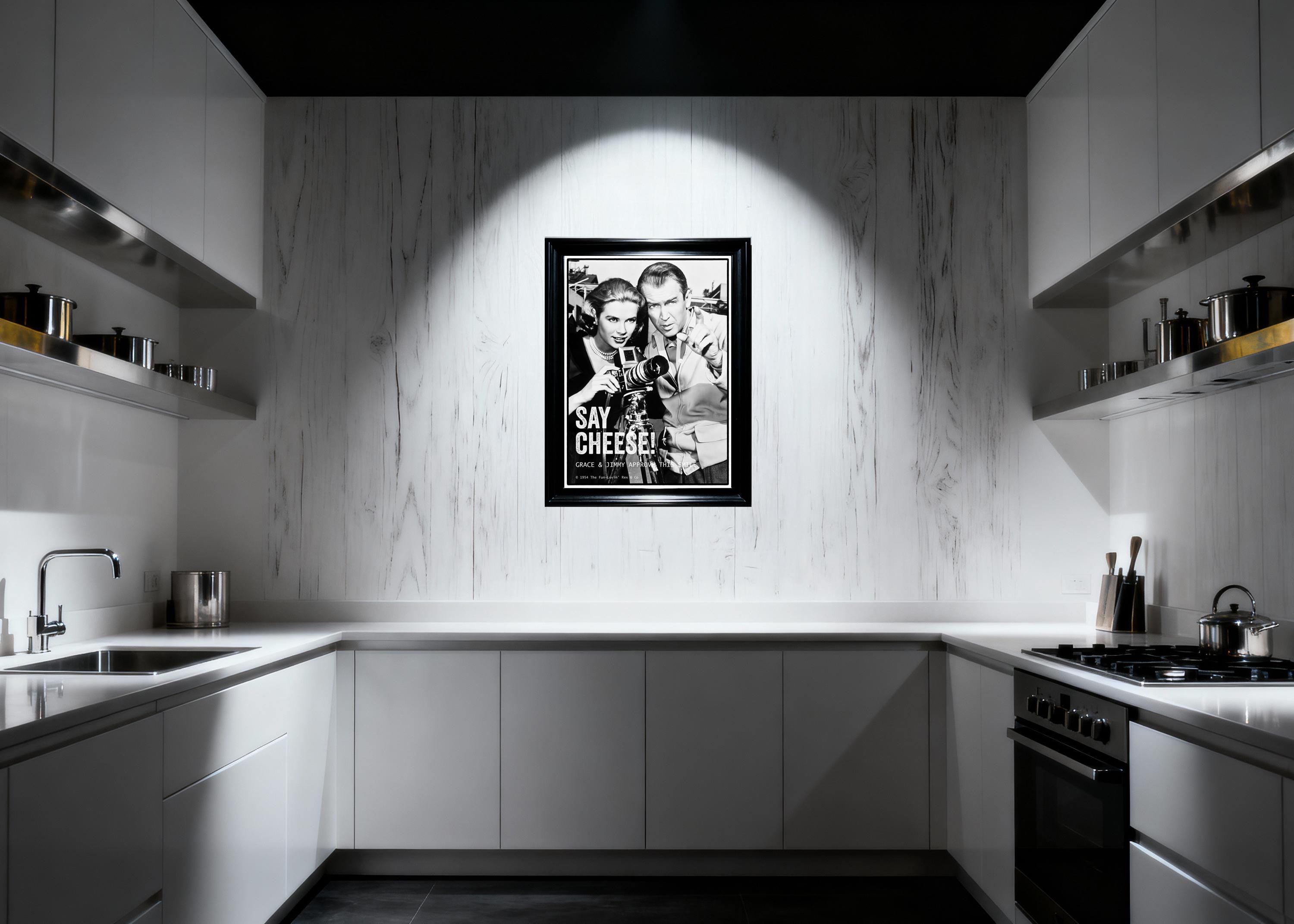 Modern kitchen with a framed poster on the wall