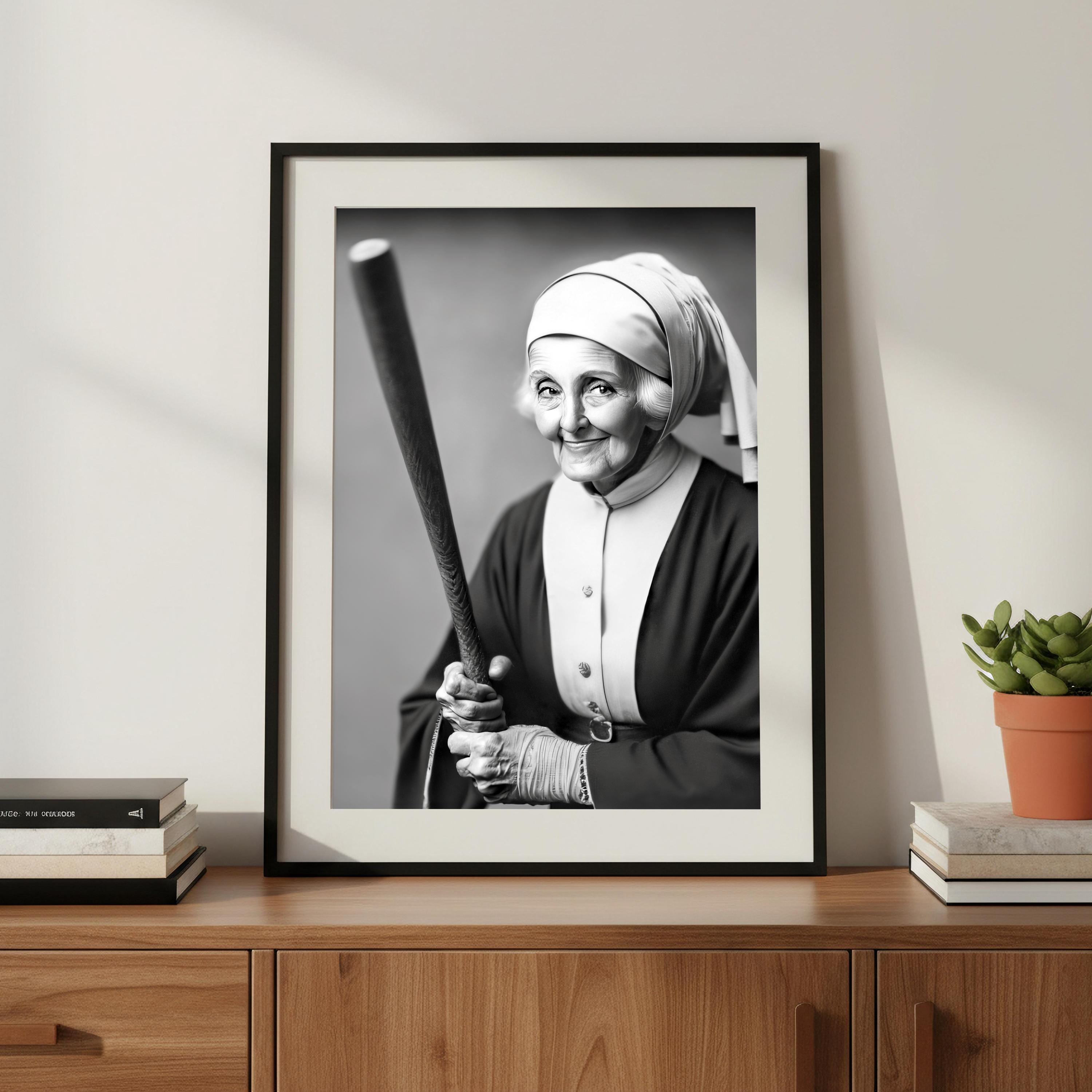 Nun holding a baseball bat print on a cabinet in living room