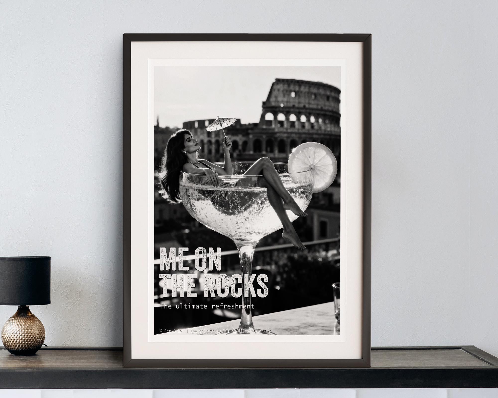 Framed poster with a cocktail and text 'Me on the Rocks' against a cityscape background.