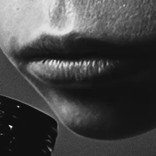 Close-up of a alien's mouth with a blurred background