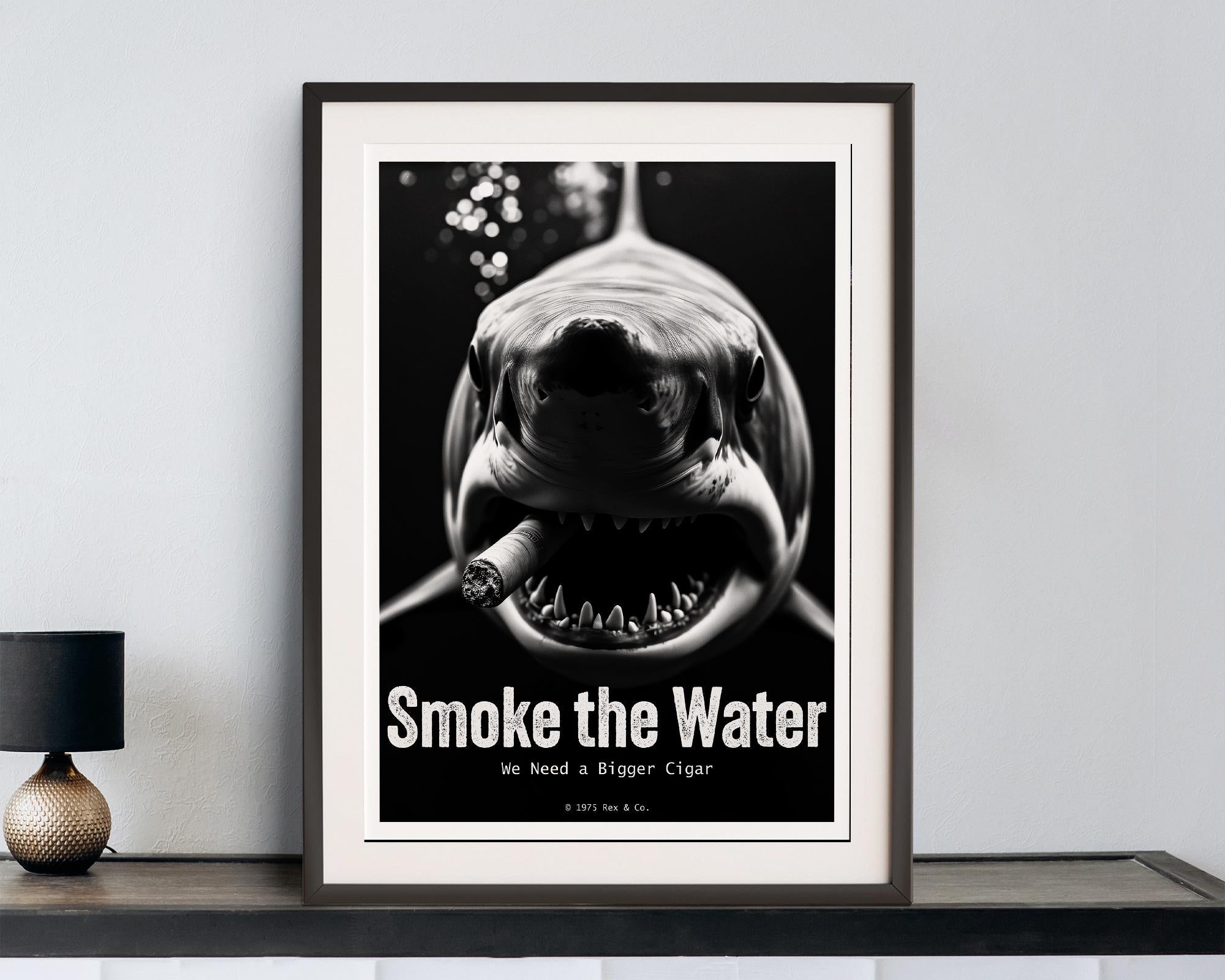 Framed poster of a shark with a cigar and text 'Smoke the Water' on a white wall.
