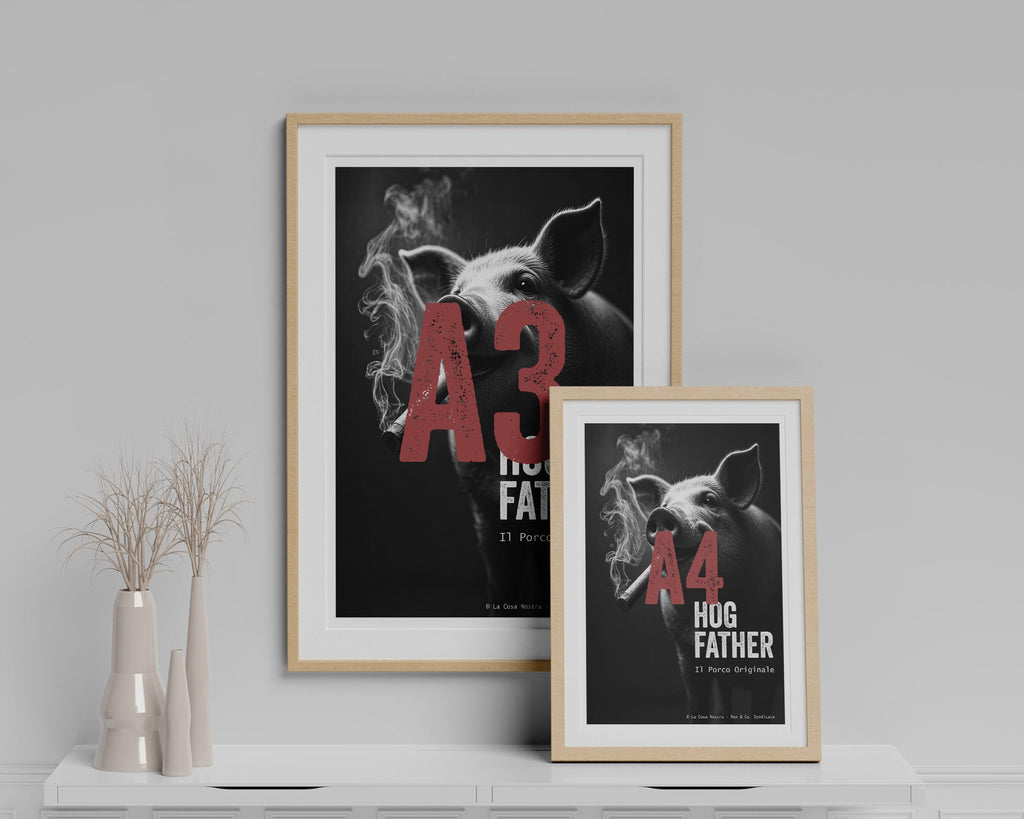 Two framed posters on a shelf with decorative vases against a gray wall.