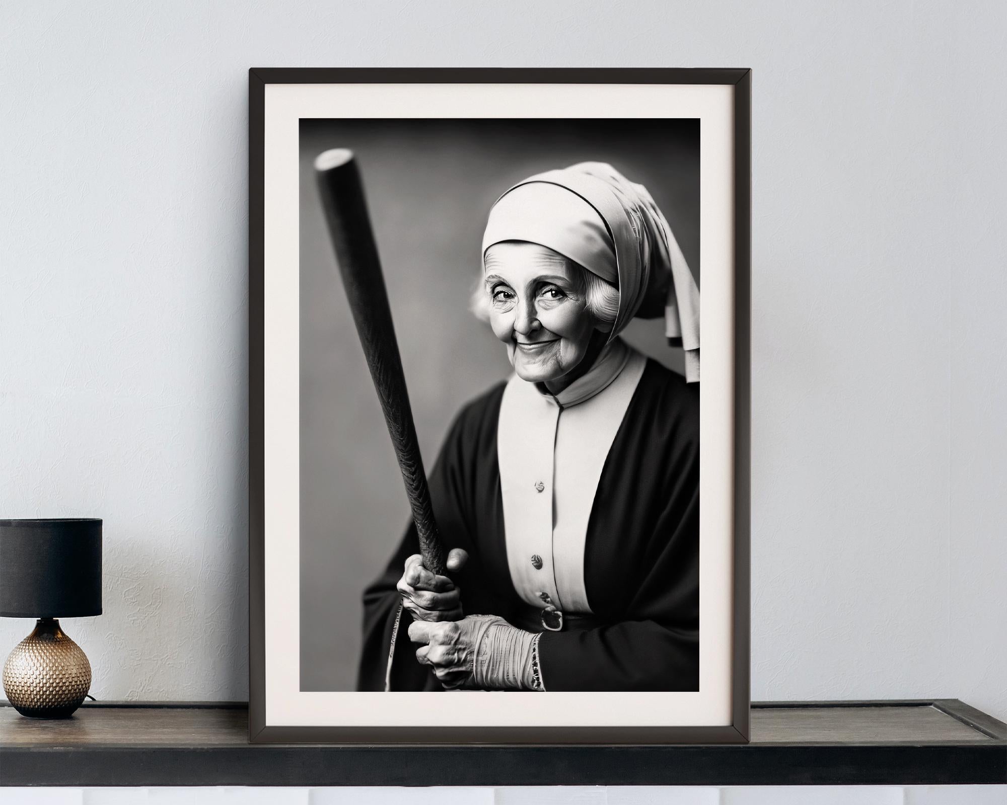 Framed black and white portrait of a nun holding a baseball bat on a shelf.