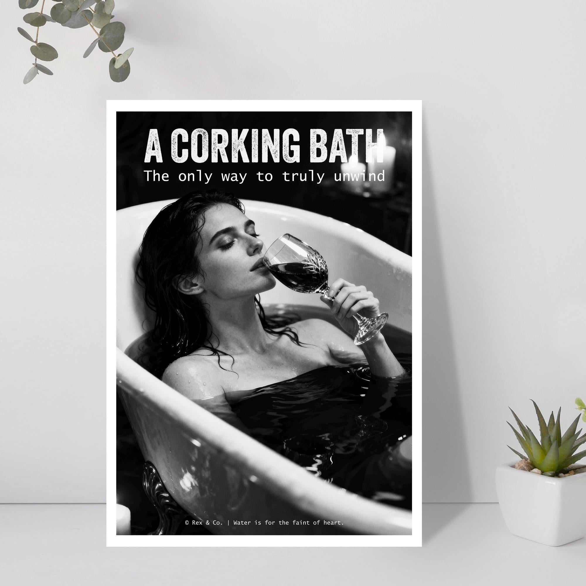 Poster of a woman in a bath holding a glass of wine with text 'A Corking Bath' on a white wall.
